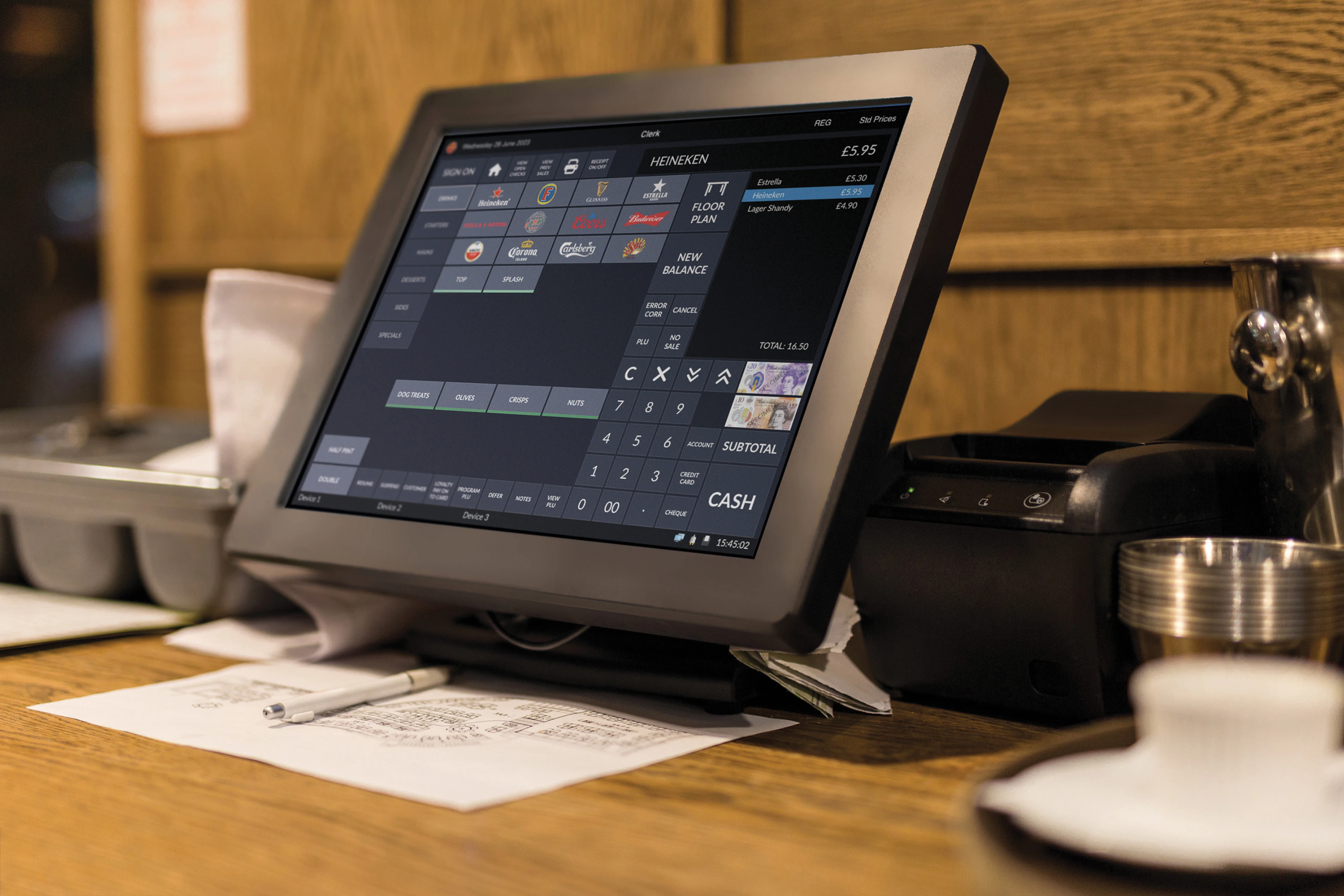 A close up of a digital tablet POS being interacted with