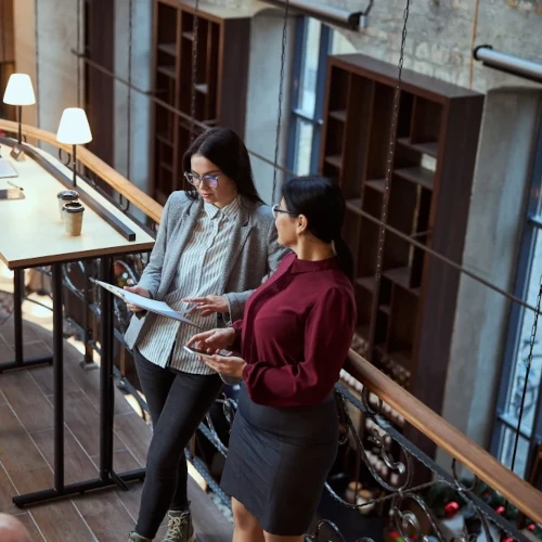 Entrepreneur smiling whilst preparing packages